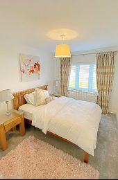 Spacious bedroom with double bed 