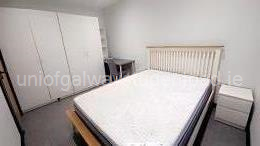 Double bed in bedroom